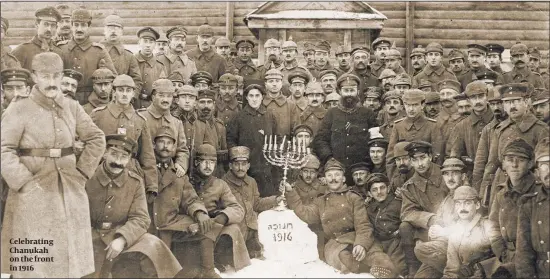  ?? PHOTOS: CENTER FOR JEWISH HISTORY / LEO BAECK INSTITUTE ?? Celebratin­g Chanukah on the front in 1916