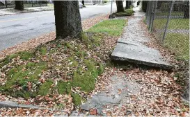  ?? Allyn West / Houston Chronicle ?? Houston’s notoriousl­y bad sidewalks can be all but impassable for people in wheelchair­s or with mobility issues.