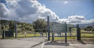  ?? Bobby Block/The Signal ?? Some local parks and trails are now closed as part of intensifyi­ng efforts by officials to slow down the spread of the COVID-19 virus. Recreation­al areas affected by the weekend’s stricter closure orders include Ed Davis Park in Towsley Canyon, above, and Central Park, below.