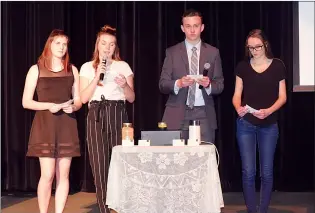  ?? NEWS PHOTO JEREMY APPEL ?? Foremost School students Heidi Walsh, Jessica Butterwick, Jordan Kurtzweg and Talynn Simanton pitch their homemade mustard business Friday to a panel of judges at Medicine Hat College.