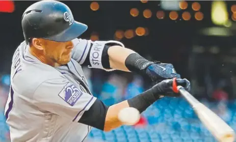  ?? Pablo Martinez Monsivais, The Associated Press ?? Entering Monday, Rockies shortstop Trevor Story, above, had struck out 53 times this season, which tied him with Arizona’s Paul Goldschmid­t for the most in the National League. Colorado batters are striking out an average of 9.24 times per game.