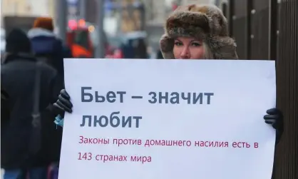  ?? Photograph: Vladimir Gerdo/TASS ?? A lone woman protests in Moscow against the decriminal­isation of domestic violence.