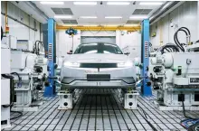  ?? Courtesy of Hyundai Motor Group ?? Hyundai Motor’s IONIQ electric vehicle (EV) undergoes a power system test at the carmaker’s Namyang R&D Center in Hwaseong, Gyeonggi Province.