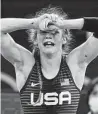  ?? Aaron Favila / Associated Press ?? Sarah Hildebrand­t is overcome with emotion after her victory.