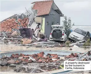  ??  ?? A property destroyed by the tsunami in Carita, Indonesia