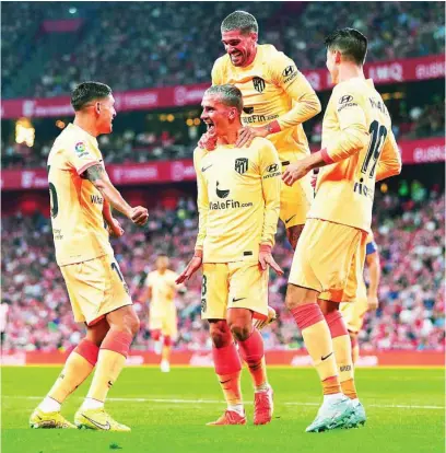  ?? EUROPA PRESS ?? Los jugadores del Atlético celebran el gol de Griezmann