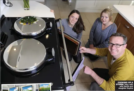  ??  ?? COOKING UP A STORM: Toby, with wife Sacha and daughter Sophia