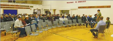  ?? SUBMITTED PHOTO EARL MORRIS ?? The school auditorium at Bindloss drew a large crowd to a Thursday meeting, where officials from CFB Suffield addressed an audience of locals in connection with the recent devastatin­g grassfire.