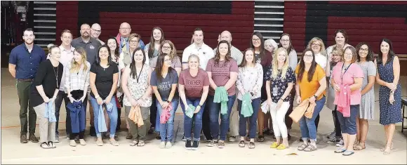  ?? TIMES photograph by Annette Beard ?? New teachers and administra­tors were welcomed to the Pea Ridge School District at a teacher in-service day