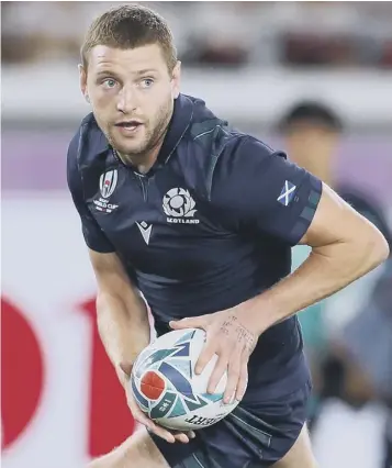  ??  ?? 0 Finn Russell in action for Scotland against Japan at the World Cup – his last game in dark blue.