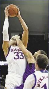  ?? GETTY ?? Kansas’ Landen Lucas takes hit in stunning loss to TCU Thursday.