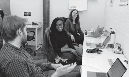  ?? Nick Himmel / New York Times ?? Matt Coolidge (from left), Lillian Ruiz and Christine Mohan, three of Civil Medias co-founders, talk strategy at the company’s headquarte­rs in New York. A group of journalist­s left the shrinking Denver Post to start a new outlet, The Colorado Sun.