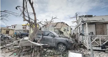  ?? — GETTY IMAGES FILES ?? A knock-on effect of the hurricanes that struck Texas and Florida this year could be an influx of flooddamag­ed vehicles in the used car market.