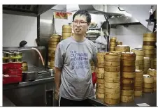  ??  ?? Chui’s son, Kwok- hing, joins a core of dedicated chefs determined to prevent the handmade tradition from dying out.
— Photos: AFP