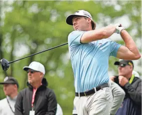  ?? ?? Sam Burns tees off on the 16th hole during a practice round for the PGA Championsh­ip on May 16 at Oak Hill Country Club. ADAM CAIRNS/USA TODAY SPORTS