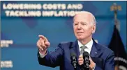  ?? Yuri Gripas/abaca Press/tns ?? U.S. President Joe Biden replies to questions from the media after delivering remarks on inflation and lower costs for working families at the White House on Tuesday.