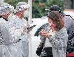  ?? JUAN BARRETO AFP VIA GETTY IMAGES ?? While we focus on how quickly we’ll get vaccines compared to Britain and the U.S., much of the world — such as those in Colombia, pictured — isn’t even in the race.