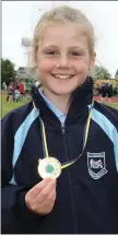  ??  ?? Chloe Murray (Ferns) won gold in the Under-9 long jump.