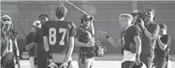  ?? CHERYL EVANS/THE REPUBLIC ?? Netflix’s “QB1: Beyond the Lights” films Pinnacle High quarterbac­k Spencer Rattler during practice on Wednesday.