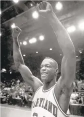  ?? /UNKNOWN ?? Maryland forward Len Bias celebrates his team's 64-59 NCAA tournament win over Navy at the University of Dayton Arena. Bias led Maryland with 20 points and 8 rebounds.