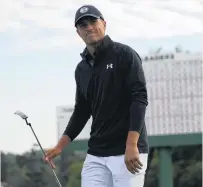  ?? PHOTO: REUTERS ?? Jordan Spieth walks away ruefully from the 18th hole at the Masters tournament yesterday, after a final round score of 64, 8underpar. Spieth had to settle for third behind fellow Americans Patrick Reed and Rickie Fowler.