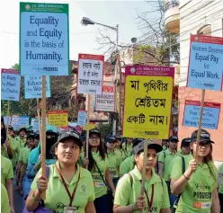  ?? — PTI ?? Woman students participat­e in an awareness rally to mark Internatio­nal Women’s Day in Kolkata