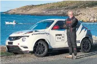  ?? JIM KENZIE FOR THE TORONTO STAR ?? Jim Kenzie with his ride ahead of the 2015 Targa Newfoundla­nd race. The race is “the most fun you can have in a car,” he says.