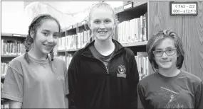  ?? LYNN KUTTER ENTERPRISE-LEADER ?? Zoe Nix, left, Lindsey Scogin and Aubree McWhorter, sixth-graders at Lynch Middle School in Farmington, were named as the honorable mention team in the state eCYBERMISS­ION competitio­n.