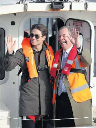  ??  ?? Joey Essex and Nigel Farage set sail together yesterday on a pilot boat at Grimsby