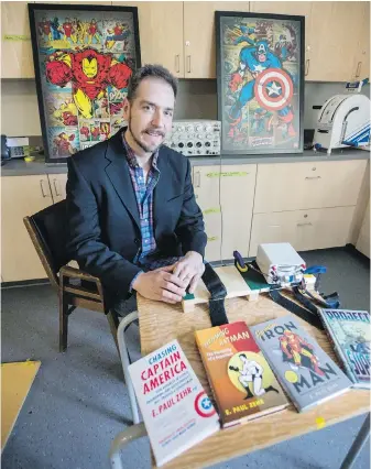  ??  ?? University of Victoria Prof. E. Paul Zehr, whose field is neuroscien­ce, has written books about superheroe­s and the possibilit­ies they present. His latest is Chasing Captain America.