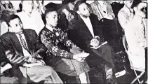  ?? Associated Press file photo ?? In this 1948 photo, Martin Luther King Jr., third from left, listens to a speaker during an assembly at Morehouse College in Atlanta. As a teenager in 1944, King worked on a tobacco farm in Connecticu­t. That experience influenced his decision to become a minister.