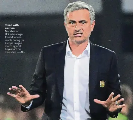  ??  ?? Tread with caution: Manchester United manager Jose Mourinho reacts during the Europa League match against Feyenoord on Thursday. — AFP