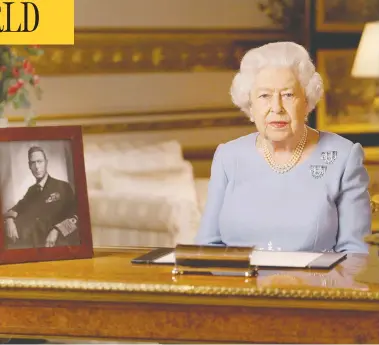  ?? BUCKINGHAM PALACE VIA GETTY IMAGES ?? Queen Elizabeth addresses the nation on the 75th anniversar­y of VE-Day at Windsor Castle on Friday at 9 p.m., the exact time her father, King George VI, shown in a photo next to Her Majesty, addressed the country in 1945.