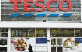  ??  ?? Profit up: A Tesco supermarke­t in central London. Britain’s biggest retailer posts 27% higher first-half profit. — Reuters