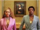  ??  ?? Beyoncé en Jay Z voor de Mona
Lisa in het Louvre in de clip van hun wereldhit Apeshit. FOTO RR