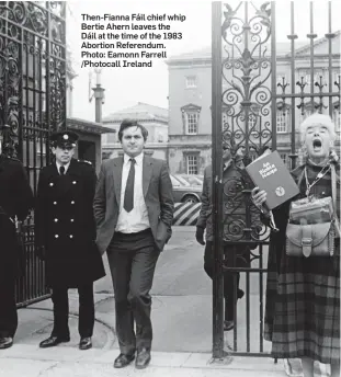  ??  ?? Then-Fianna Fáil chief whip Bertie Ahern leaves the Dáil at the time of the 1983 Abortion Referendum. Photo: Eamonn Farrell /Photocall Ireland