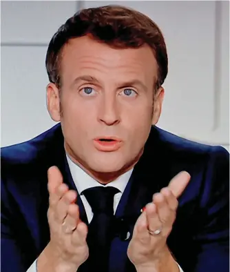  ??  ?? No options: Macron in his TV address yesterday to announce the lockdown