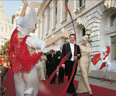  ?? Liz Hafalia / The Chronicle 2011 ?? John Manoyan and Susan King Manoyan arrive for the San Francisco Opera opening-night gala on Sept. 9.