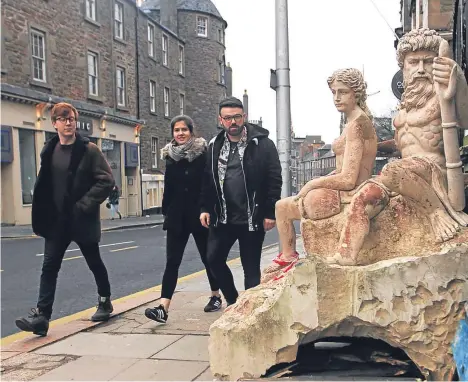  ??  ?? A STATUE has appeared outside an as-yet unopened restaurant said to have been inspired by Game of Thrones in Dundee.
Dynasty, on Perth Road, is the latest venture by Dundee graduate Usman Malik, who also owns Oshibori Japanese restaurant in the...