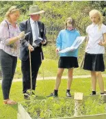  ??  ?? Pictured are pupils from St Bartholome­w’s School speaking to the judges.