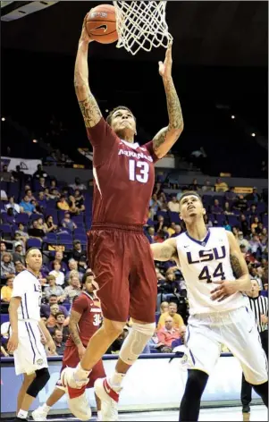  ?? Special to the Democrat-Gazette/CHRIS DAIGLE ?? Arkansas forward Dustin Thomas bounced back from two subpar performanc­es to spark the Razorbacks with 9 points, 9 rebounds and 3 steals in 26 minutes off the bench in Saturday night’s 78-70 come-from-behind victory over LSU.