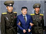  ?? ASSOCIATED PRESS 2016 ?? Kim Dong Chul is escorted to his trial in Pyongyang in 2016. U.S. Secretary of State Mike Pompeo left North Korea with three American detainees who were released ahead of an upcoming summit.