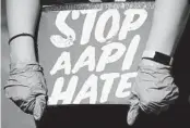  ?? NAM Y. HUH AP ?? A third of Asian Americans and Pacific Islanders say they have experience­d an act of abuse based on their race or ethnicity in the last year.