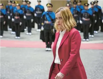  ?? ANDREW MEDICHINI/AP ?? Italian Prime Minister Giorgia Meloni arrives to meet Kazakhstan’s president Jan. 18 at Chigi Palace, the Italian government office in Rome. Since taking office in 2022, the once vocally anti-EU Meloni has become pragmatica­lly pro-EU.