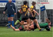  ?? PHOTO: VIRGINIA WOOLF/FAIRFAX NZ ?? Marist centre Fern Hoskin scores the winning try against Motueka High School.