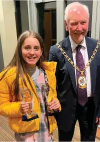  ??  ?? Nicole Kitchin and her awards with the Mayor of Cheshire, Councillor Barry Burkhill