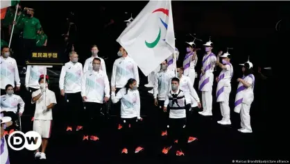  ??  ?? The six-person Refugee Team led the opening ceremony at the 2020 Tokyo Paralympic­s