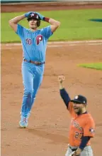  ?? MATT ROURKE/AP ?? J.T. Realmuto reacts after flying out during the ninth inning in Game 5 against the Astros on Thursday in Philadelph­ia. The Astros won 3-2.
GAME 6: Tonight at Houston, 8:03 p.m. (FOX)