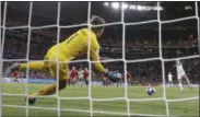  ?? ALESSANDRA TARANTINO ?? United States goalkeeper Alyssa Naeher saves a penalty shot taken by England’s Steph Houghton during the Women’s World Cup semifinal soccer match between England and the United States, at the Stade de Lyon, outside Lyon, France, Tuesday, July 2, 2019.