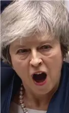  ??  ?? Embattled: Theresa May in the Commons last night speaking after her huge defeat